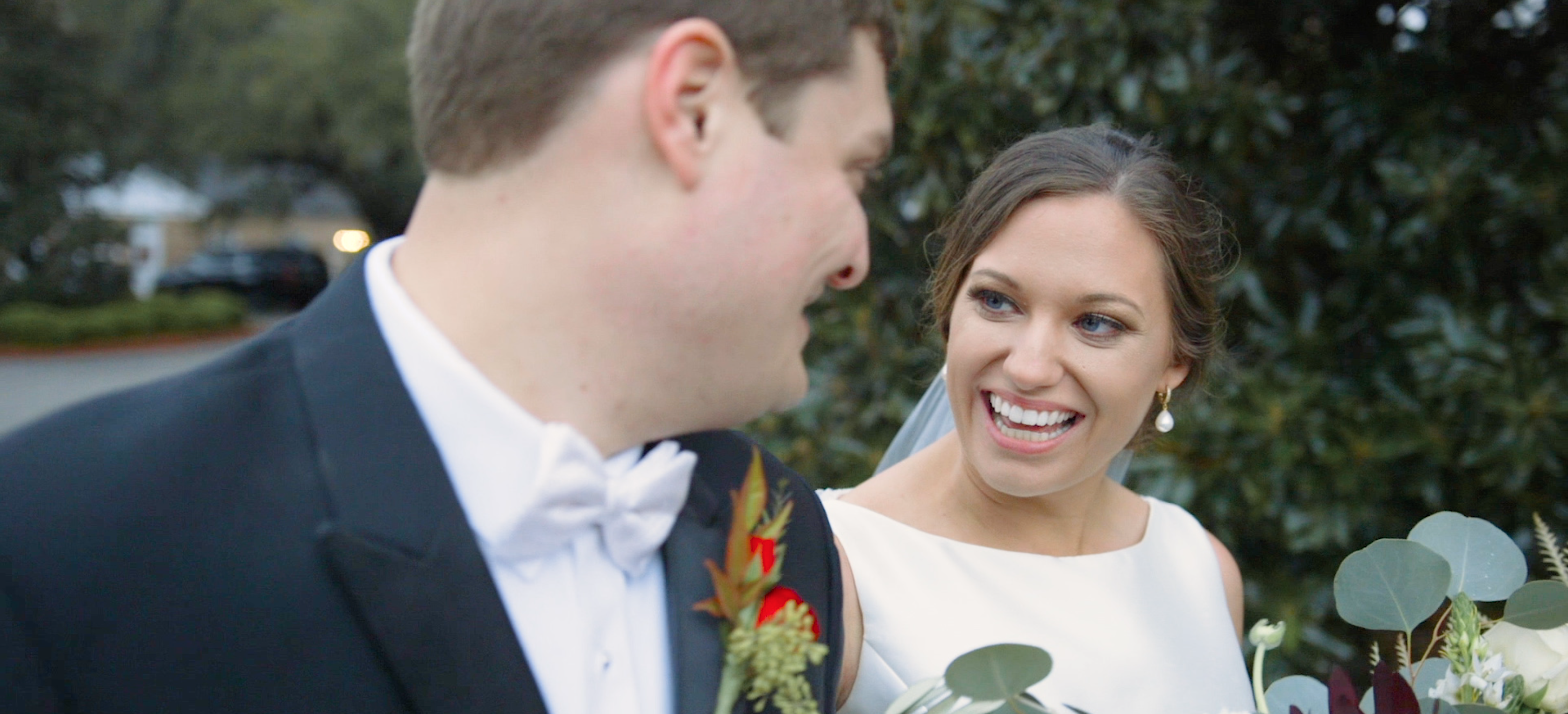 bride smiles at groom florence country club wedding