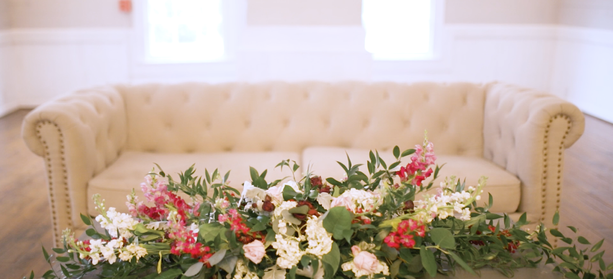 Couch and flowers Mims House Wedding Venue