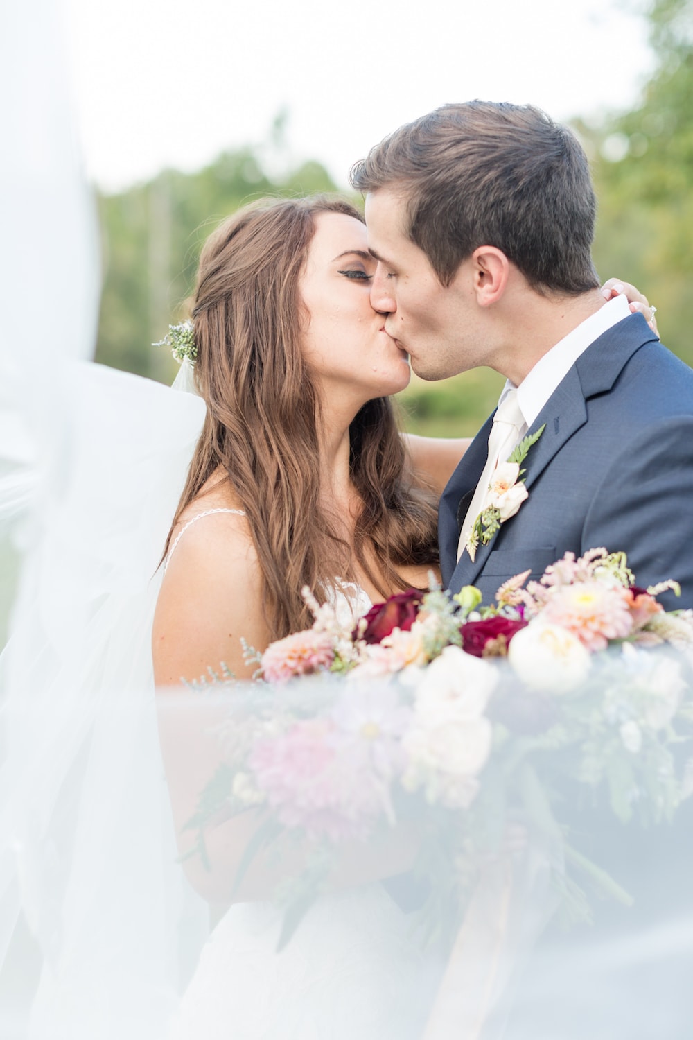 bride and groom kiss